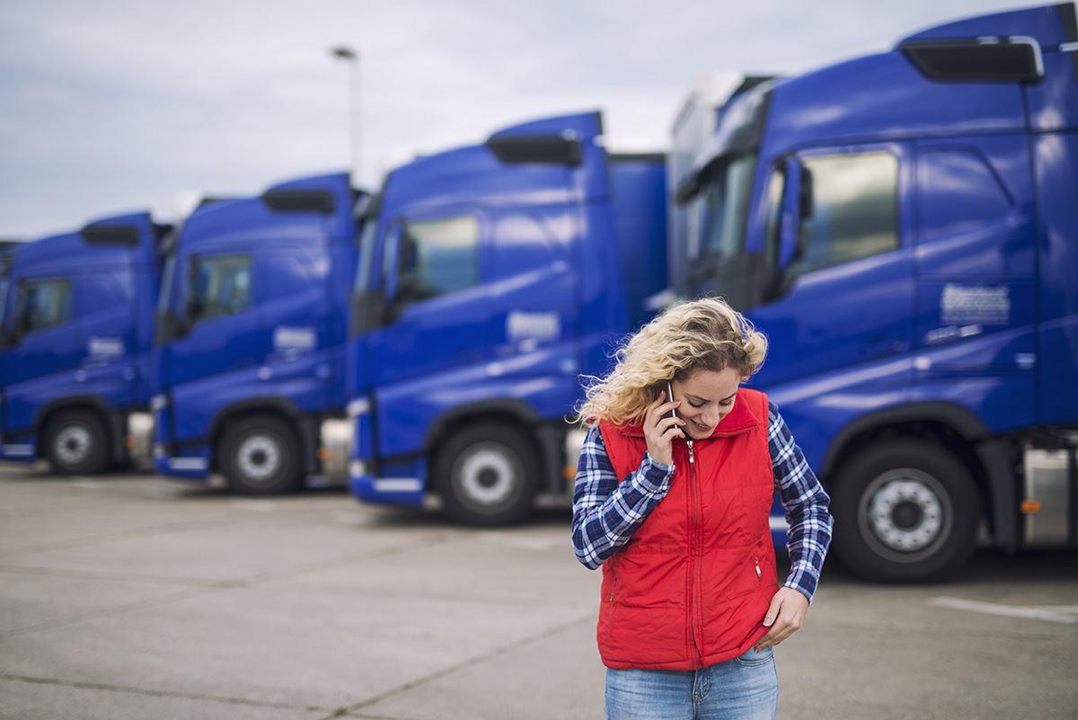 female trucker talking on the phone