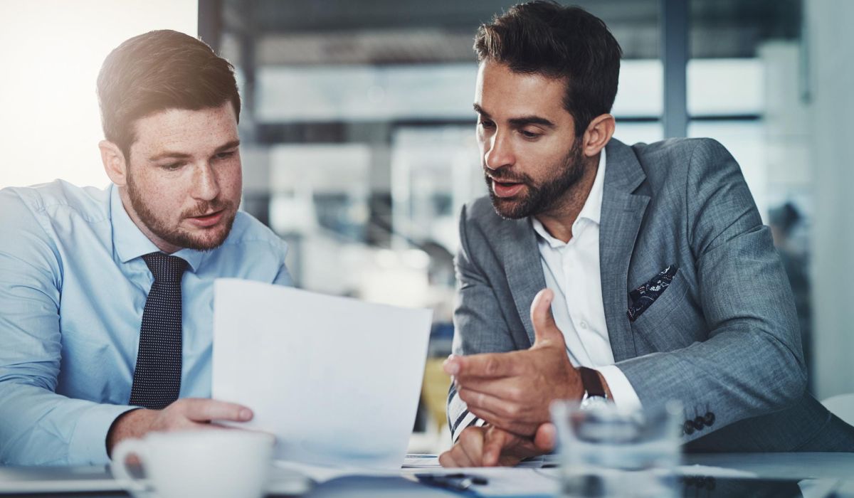 Two business people talking