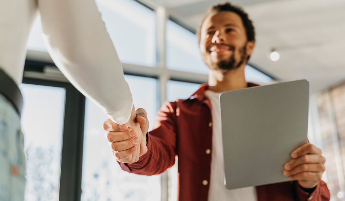 Close up of two people shaking hands