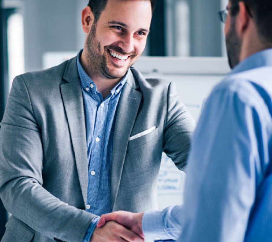 Two businessman shaking hands