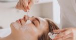 A woman receiving a facial treatment 