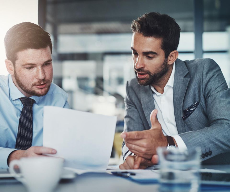 Two business people talking