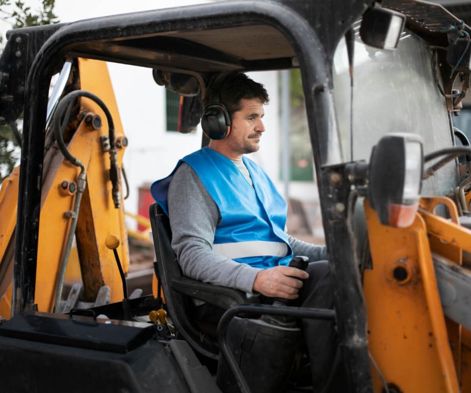 Man using an excavator for digging on day light