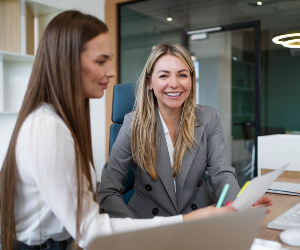 Side view smiley women working together