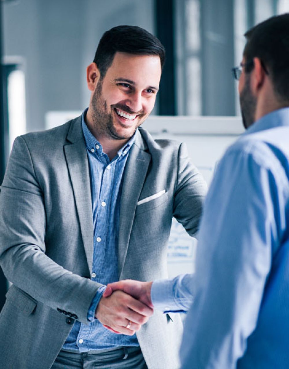 Two businessman shaking hands